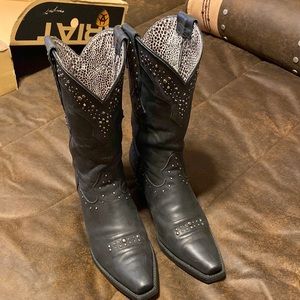 Women’s Rhinestone Cowboy boots with silver studs.